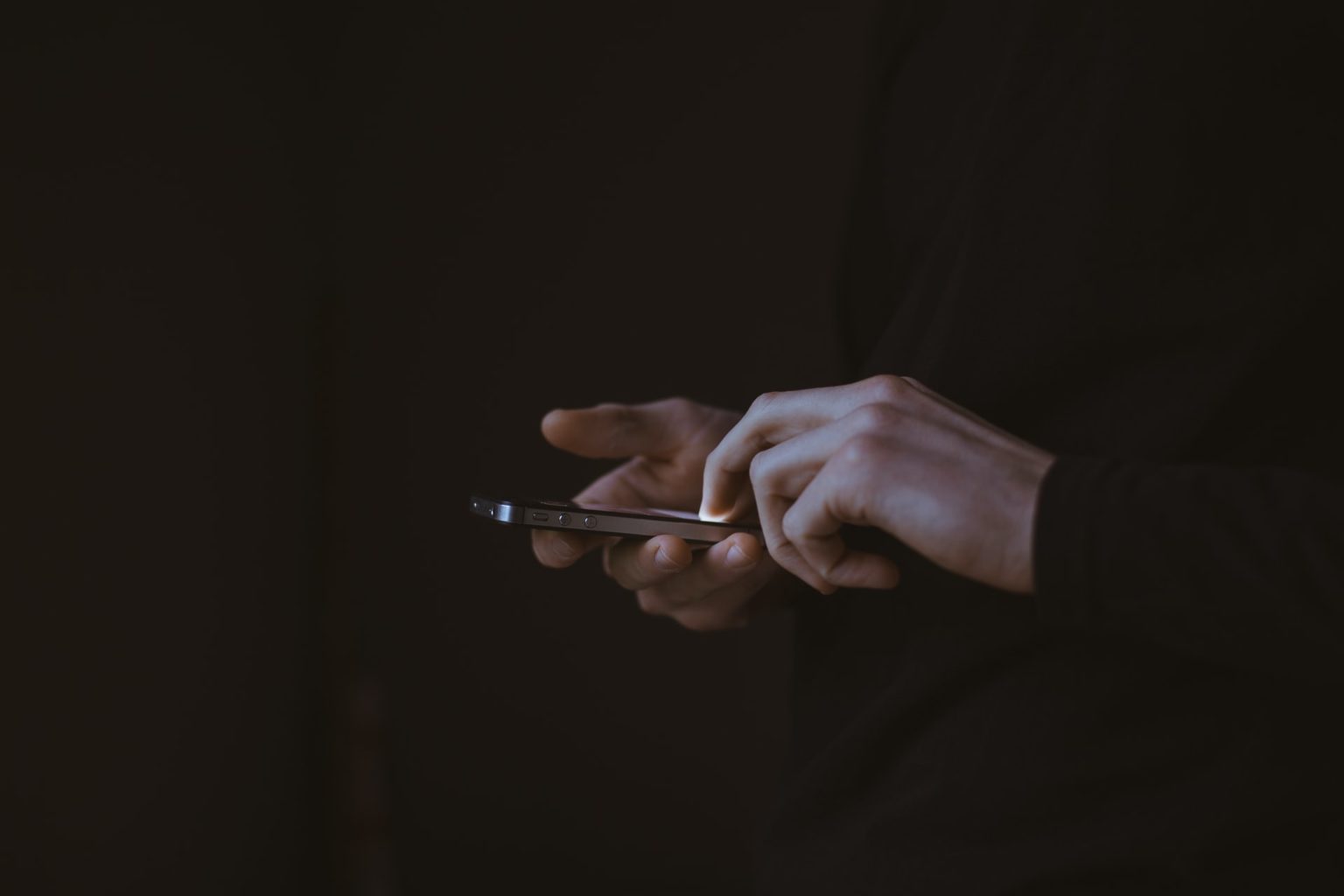 a person holding a glass