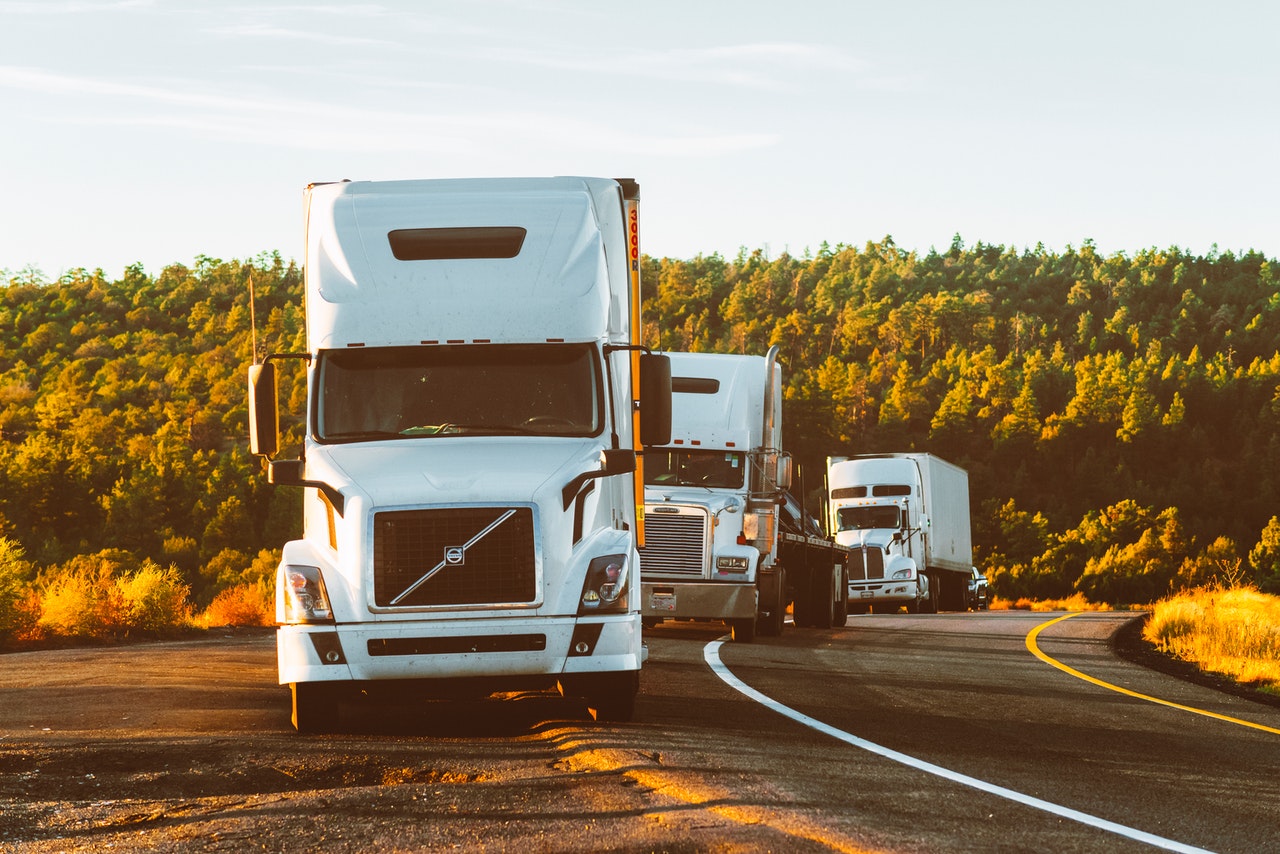 a group of trucks on a road