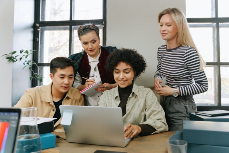 a group of people around a table