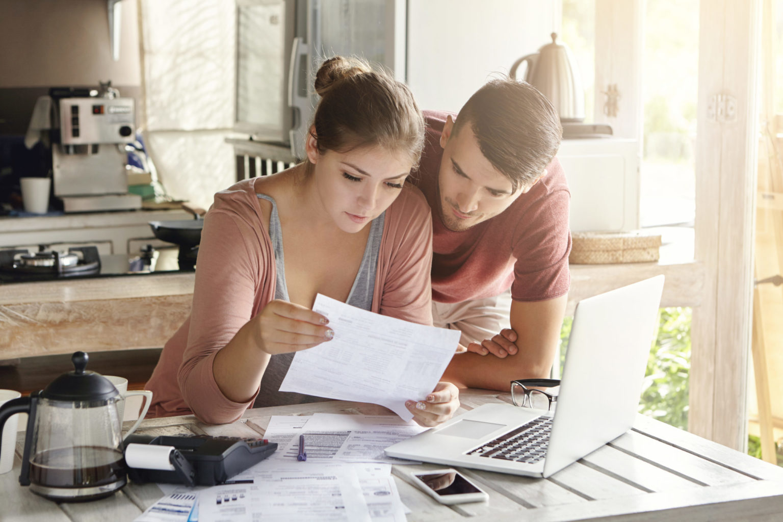 Young couple managing finances